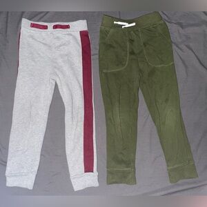 Two pairs of boy sweats.